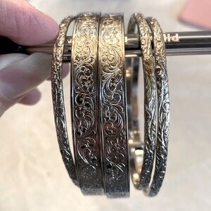 Five Silver Bangle Bracelets